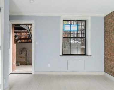 East 11th Street - Photo Thumbnail 3