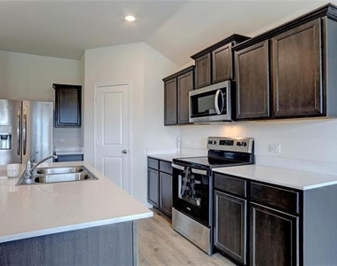 6517 Waterfall Lane - Photo Thumbnail 2