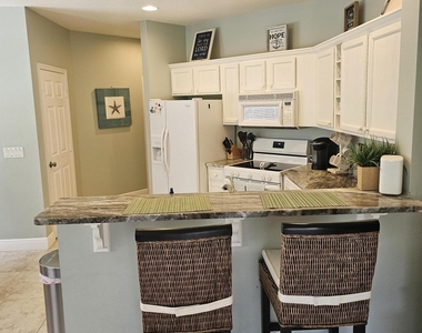 8227 Mulligan Circle - Photo Thumbnail 2