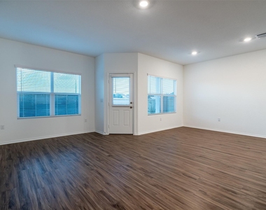 7100 Dancing Wind Ln - Photo Thumbnail 3