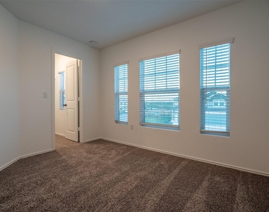 7100 Dancing Wind Ln - Photo Thumbnail 10