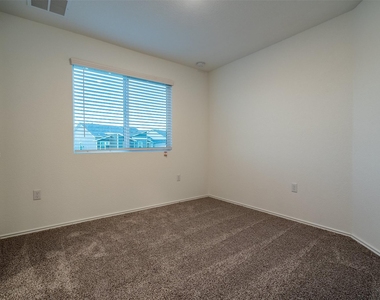 7100 Dancing Wind Ln - Photo Thumbnail 11