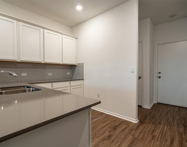 7100 Dancing Wind Ln - Photo Thumbnail 7