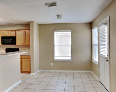 8030 Echinacea Drive - Photo Thumbnail 2