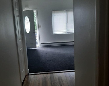 824 E 8th Street E - Photo Thumbnail 2