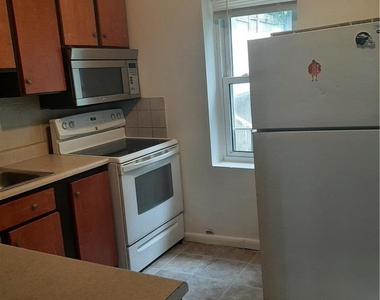 824 E 8th Street E - Photo Thumbnail 1