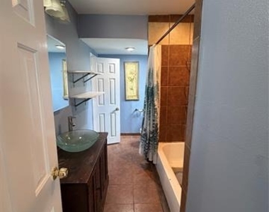 1227 W Avenue Avenue E - Photo Thumbnail 4