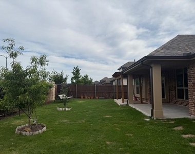 1009 Tree Shadow Lane - Photo Thumbnail 1