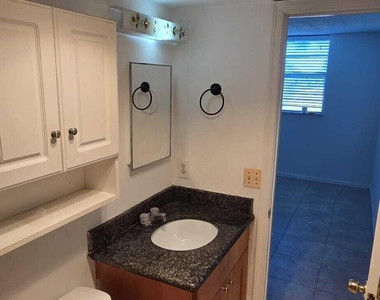 9949 Sandalfoot Boulevard - Photo Thumbnail 6