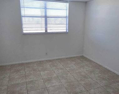 9949 Sandalfoot Boulevard - Photo Thumbnail 12