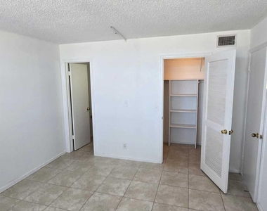 9949 Sandalfoot Boulevard - Photo Thumbnail 19