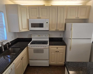 9949 Sandalfoot Boulevard - Photo Thumbnail 1