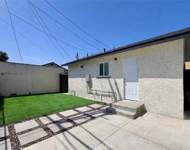 1426 W 83rd - Photo Thumbnail 2