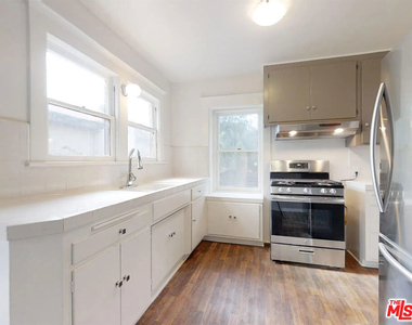 1260 N Flores Street - Photo Thumbnail 3