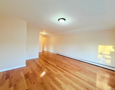 239-13 86th Avenue - Photo Thumbnail 4