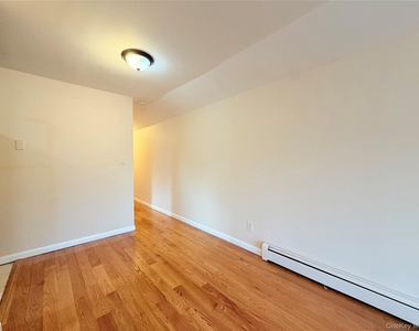 239-13 86th Avenue - Photo Thumbnail 3