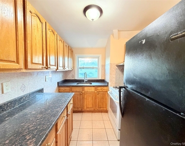 239-13 86th Avenue - Photo Thumbnail 6