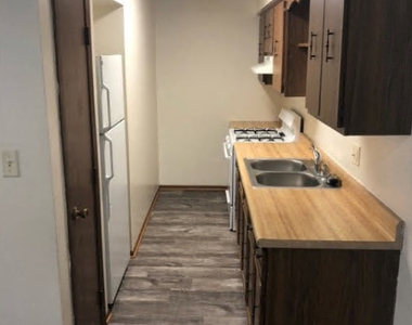 1320 E 38th Street - Photo Thumbnail 2