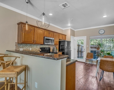 305 Holleman Drive E - Photo Thumbnail 2