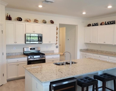 17335 Blue Ridge Place - Photo Thumbnail 4