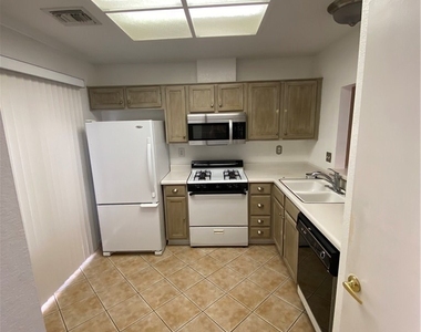 9033 Gemstone Drive - Photo Thumbnail 2