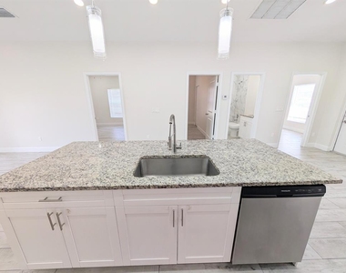 1566 W 26th Court - Photo Thumbnail 2
