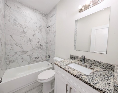 1566 W 26th Court - Photo Thumbnail 4