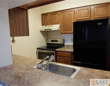 4906 Ravens Crest Drive - Photo Thumbnail 2