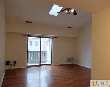 4906 Ravens Crest Drive - Photo Thumbnail 3