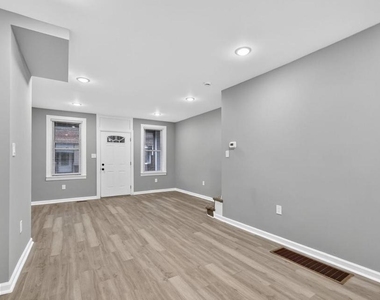 1333 S Newkirk Street - Photo Thumbnail 2