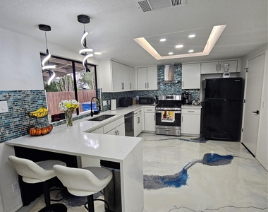 10706 Berthound Dr - Photo Thumbnail 10