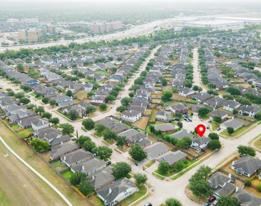 10003 Lynette Falls Drive - Photo Thumbnail 3