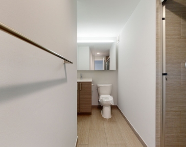 401 E 34th St - Photo Thumbnail 4