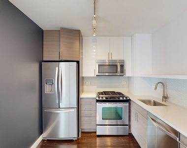 401 E 34th St - Photo Thumbnail 1