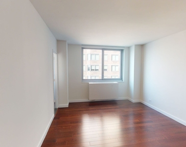 401 E 34th St - Photo Thumbnail 3