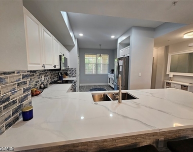 10700 Ravenna Way - Photo Thumbnail 5