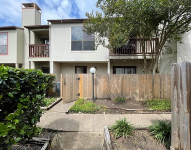 3909 Tanglewilde Street - Photo Thumbnail 2