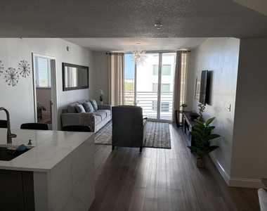 1551 N Flagler Drive - Photo Thumbnail 3