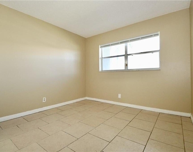 9915 Sandalfoot Boulevard - Photo Thumbnail 10