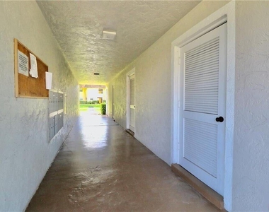 9915 Sandalfoot Boulevard - Photo Thumbnail 5