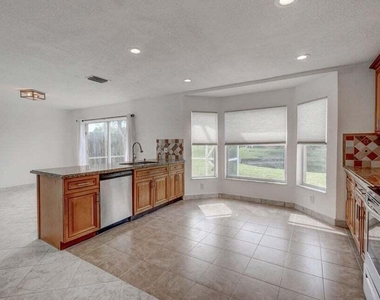 10758 Lake Jasmine Drive - Photo Thumbnail 3