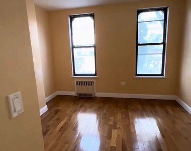 East 138th Street - Photo Thumbnail 2