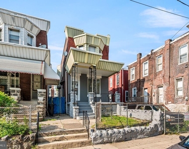 5011 Larchwood Avenue - Photo Thumbnail 3
