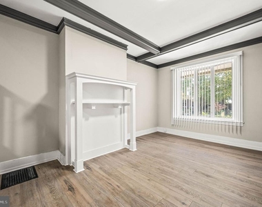 5011 Larchwood Avenue - Photo Thumbnail 4