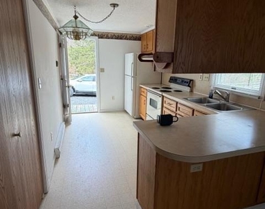 9012 Rabbit Road N - Photo Thumbnail 3
