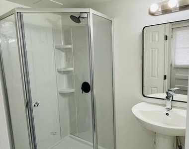 5015 Wilkens Ave - Photo Thumbnail 5
