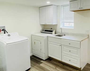 5015 Wilkens Ave - Photo Thumbnail 2