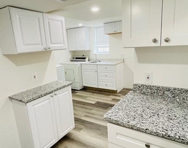 5015 Wilkens Ave - Photo Thumbnail 1