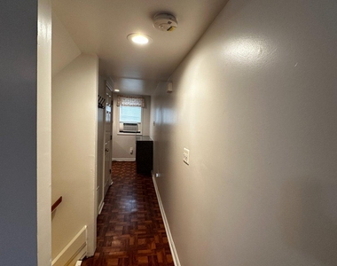 1527 W 36th Street - Photo Thumbnail 3
