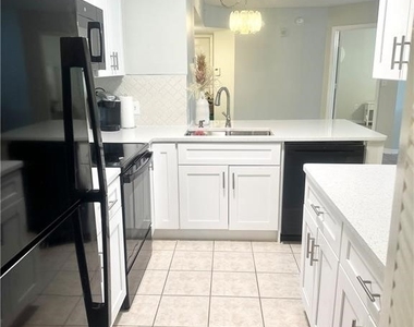 8940 Colonnades Court E - Photo Thumbnail 13